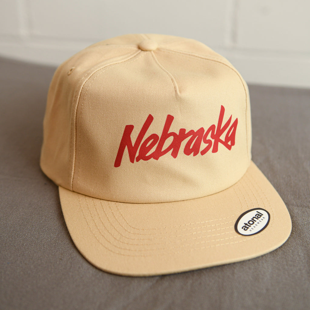 Nebraska Ivory Snapback Flatbill