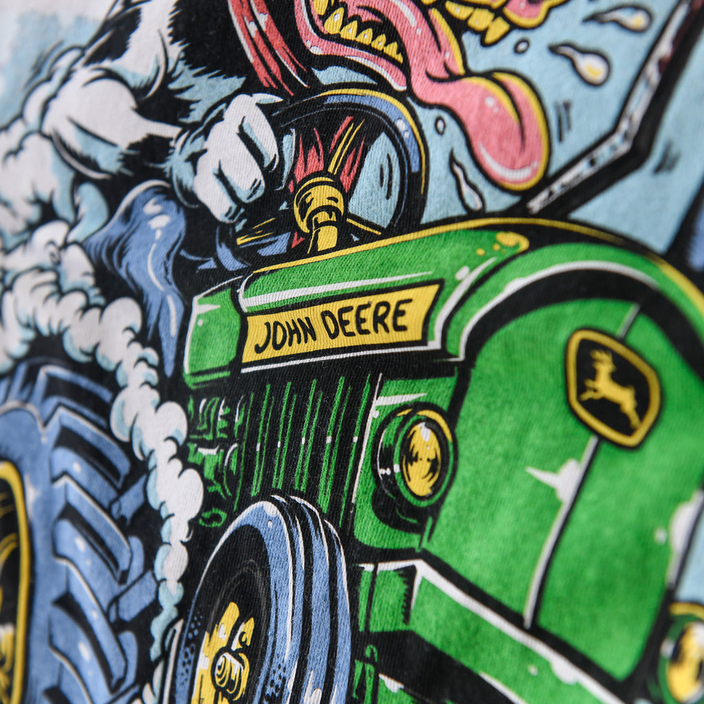 Green tractor and steering wheel detail on black Nebraska Corn Fiend tee