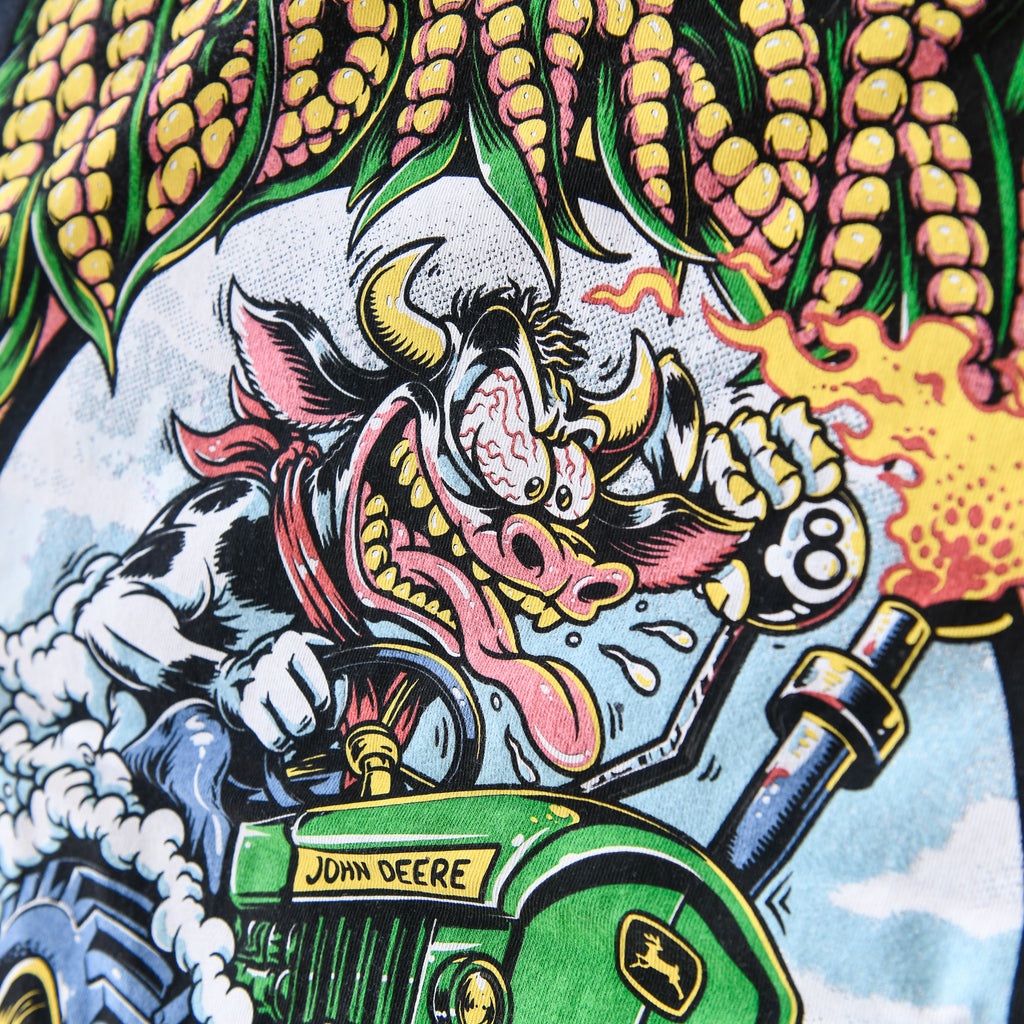 Cow, flames and eight-ball shifter detail on black Nebraska Corn Fiend tee