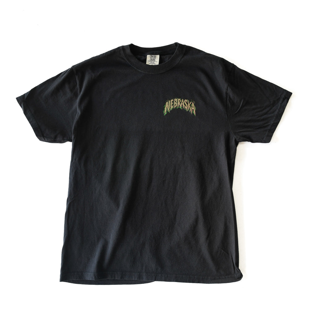 Front of black Comfort Colors Nebraska Corn Fiend tee with small Nebraska corn chest print
