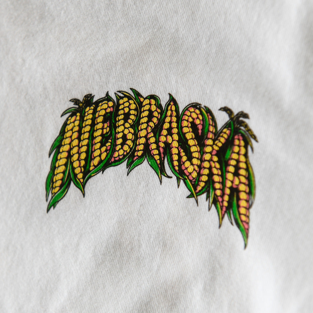 Nebraska corn lettering on white tee chest print