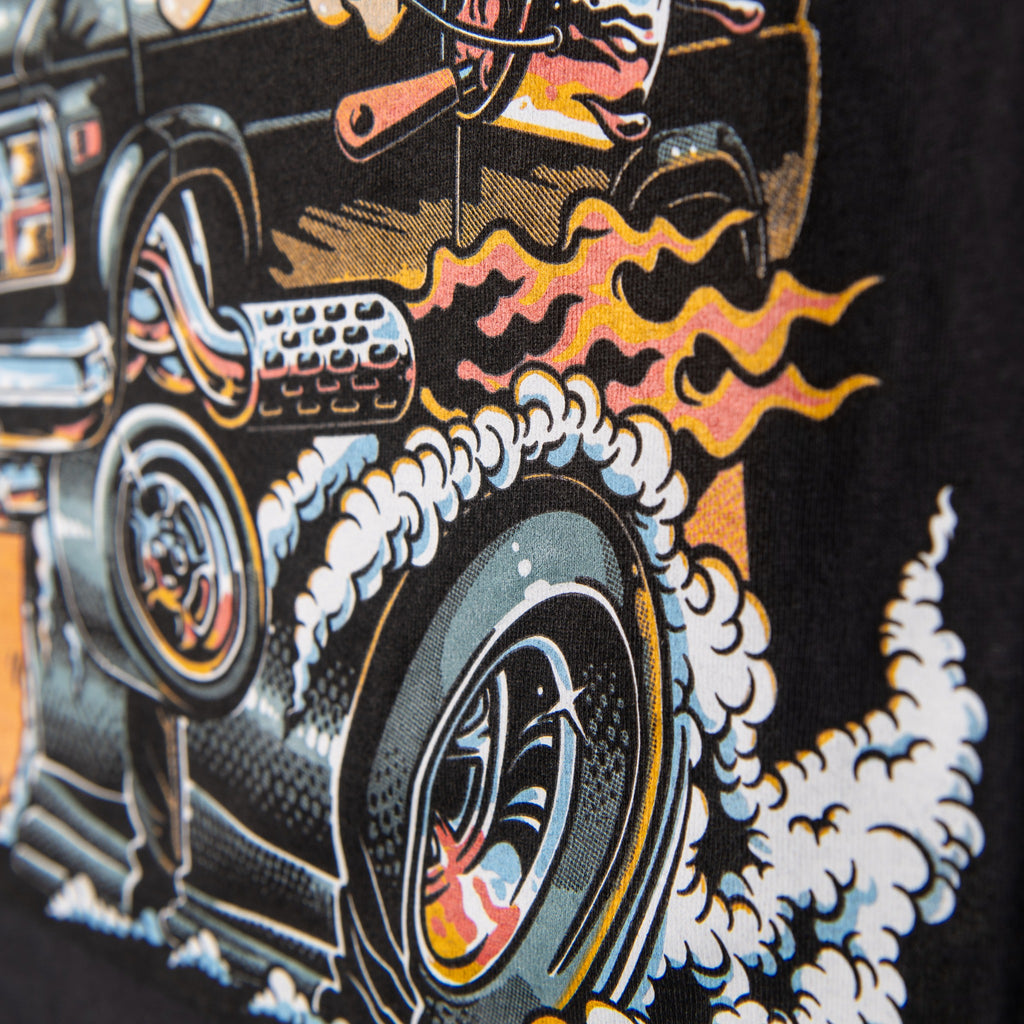 Close-up of hot rod van flames, racing tires and smoke on the back graphic
