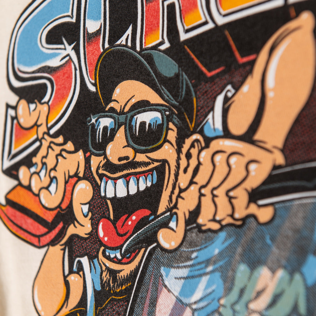 Close-up of cartoon character and retro lettering in cream long sleeve back print